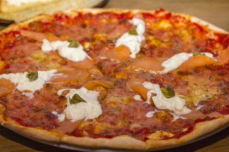 Pizza with fish and cheese close-up. Seafoodの写真素材