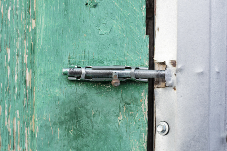 heck on the wooden door. Close-upの写真素材