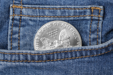 Coin Silver Dollar in Denim Pocketの写真素材