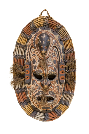 Mask ritual from a tree, decorated with paints on a white background. Isolated objectの写真素材