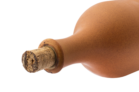 Part of a clay bottle closed with a cork on a white background. isolated objectの写真素材