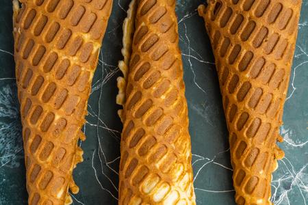 waffle horn on blue background. view from aboveの写真素材
