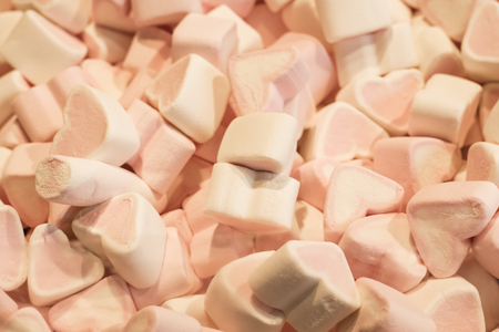 marshmallows in the shape of a heart. Background Textureの写真素材