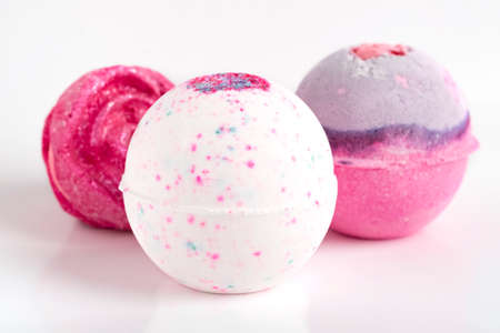 set of beautiful bath bombs. Aromatic bath salts in the form of a ball. Light backgroundの写真素材