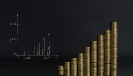 arrangement of coins on grey background