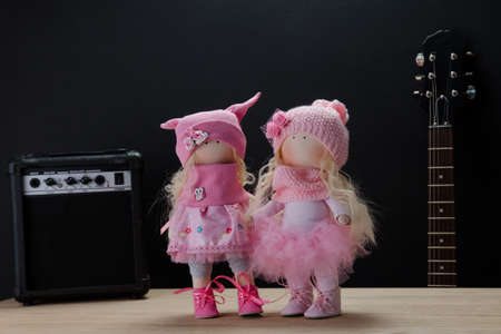 beautiful handmade dolls on a gray backgroundの写真素材