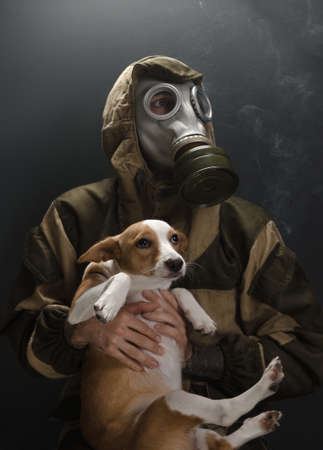 the photo of man in gas mask on grey backgroundの写真素材