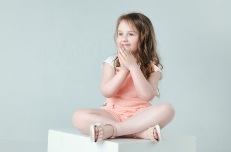 child in the Studio posing in fashionable clothes