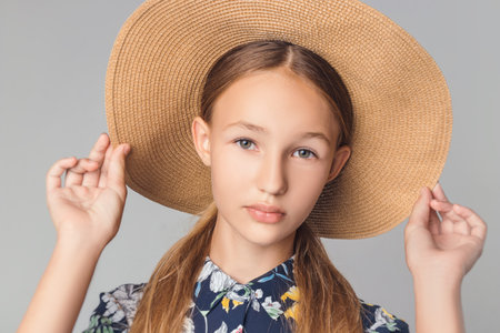 child in the Studio posing in fashionable clothes