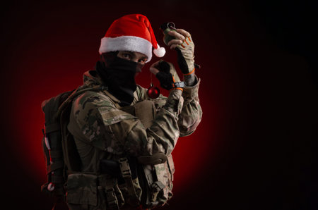 a man in a military uniform with a gun and a Santa Claus hat