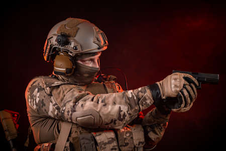 special forces soldiers in a helmet with a gunの写真素材