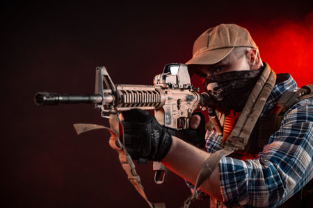 a police agent in civilian clothes and armor with an automatic rifle
