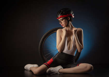 girl cyclist sexy Nude in a helmetの写真素材