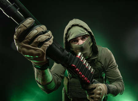 mercenary soldier with a shotgunの写真素材
