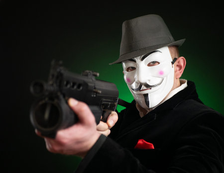 Russia - Belgorod - 02 May 2020 - The Photo of Businessman wearing Vendetta mask. This mask is a...