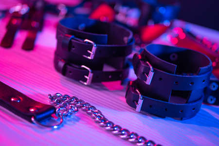 the set of erotic toys for BDSM. The game of sexual slavery with a whip, gag and leather blindfold. Intimate sex gamesの写真素材