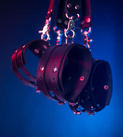 the set of erotic toys for BDSM. The game of sexual slavery with a whip, gag and leather blindfold. Intimate sex gamesの写真素材