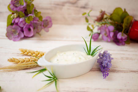 vegan white sauce on tableの写真素材