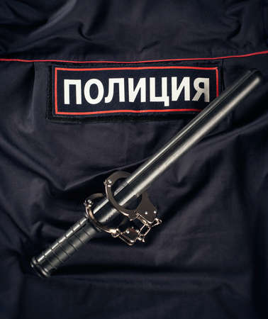 Russian Police Uniform with Baton and Handcuffs English Translation-Policeの写真素材