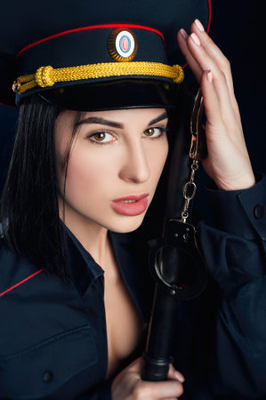 Portrait of a woman in a Russian police uniform English translation police