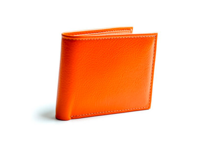 Orange leather wallet isolated on white background. Mockup.の素材