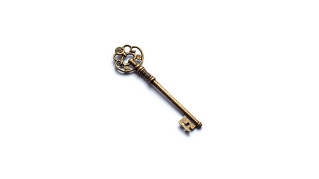 Old key isolated on white background.の素材