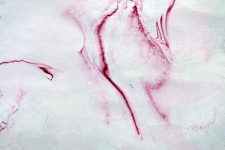 Abstract colorful red oil ink on paper close-up background texture