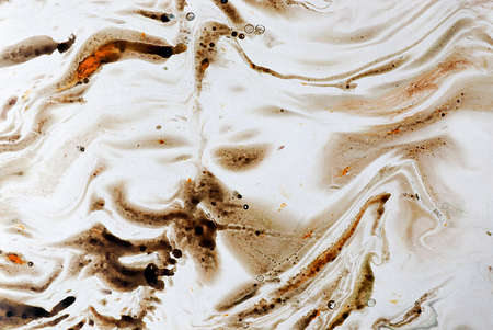 Abstract colorful oil ink on paper close-up background textureの写真素材