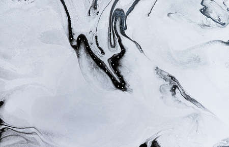 black Abstract oil ink on paper close-up background textureの写真素材