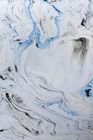 Abstract colorful blue oil ink on paper close-up background texture