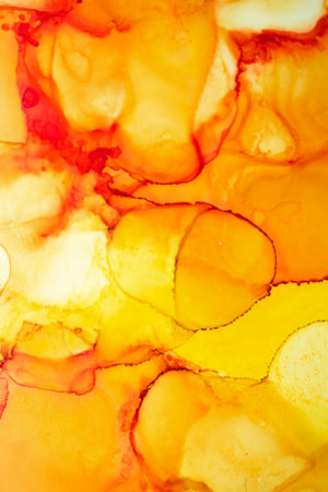 splash yellow and red alcohol ink banner. Watercolor ink Natural luxury abstract fluid art painting background alcohol ink techniqueの写真素材