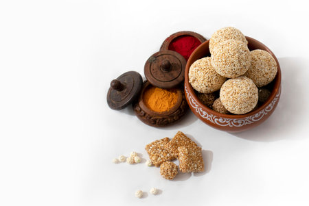 makar sankranti , Till ke laddu made from Amaranth seed in Bowl on Brown background Indian sweet for traditional festivalの写真素材