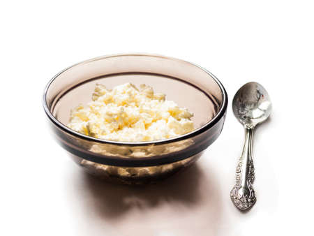 Simple breakfast with curd and milk on white backgroundの写真素材