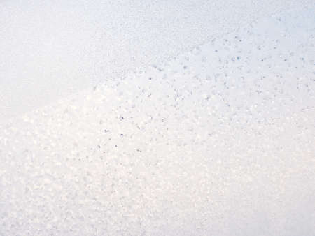 Silver winter background with frost patternの写真素材