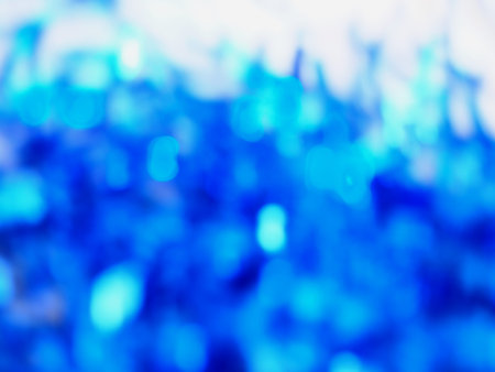 Sparkling blue texture. bokeh abstract light background