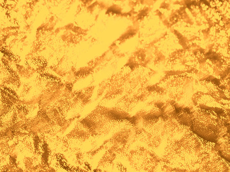 Golden abstract background made of wrinkled gold paper