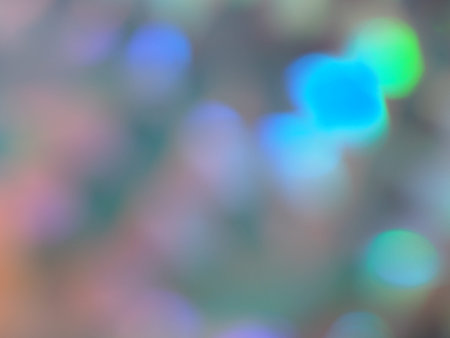 Holographic bokeh green and yellow lights festive background. Holiday backdrop. Design for your ad,...