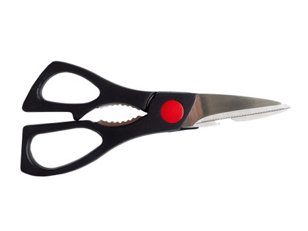 Kitchen scissors in a black plastic rim isolated on a white background