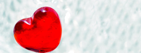 Heart shape transparent sugar candy close up image. Beautiful Valentine's day concept. Close up...