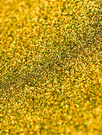 Golden bokeh lights background. Beautiful festive backdrop. Design for your ad, poster, bannerの写真素材