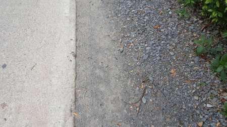 Cement road with gravel roadの写真素材