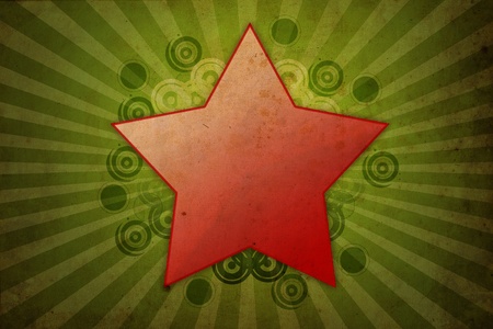 Grunge red star on green background textureの写真素材