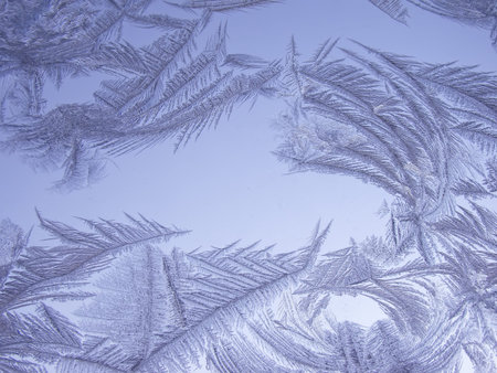 Frosty natural pattern on winter window
