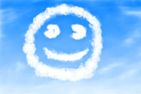 Smile combined from clouds on blue background の写真素材