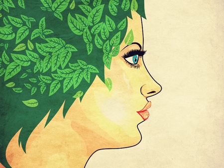 Portrait of a girl with green hair and leaves on grunge background.の写真素材
