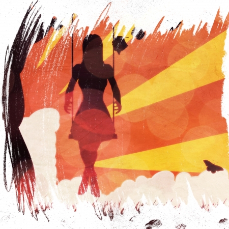 Silhouette of a girl on swing under the tree on grunge sunset background.の写真素材