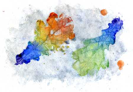 Abstract gouache painted oak leaves in rainbow colors.の写真素材