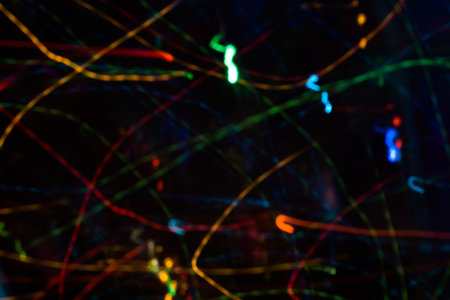 Colorful lights blurred in motion as abstract background.