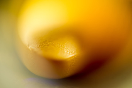 Macro of yellow pills, abstract defocused background.の写真素材