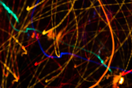 Colorful lights blurred in motion as abstract background.